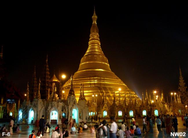 View of Shwedagon after dark from Aungmyea. ( Normally cooler in the evening and usually more people can be seen praying there than during the middle hours of the day.)