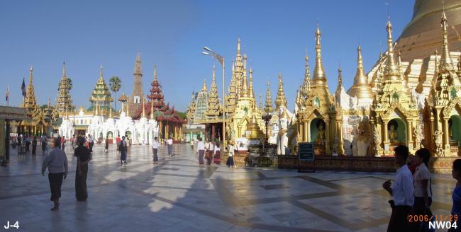 A panoramic view around the Northwest Middle Terrace. ( Note the North Welcoming Tazaug. Mahabodhi and Naungdawgyi Pagodas.)