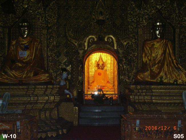 High lighted Konagamana Buddha. The rest is low lighted. ( A quiet evening, but uplifting setting for meditation.) 