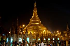 View of Shwedagon after dark from Aungmyea. ( Normally cooler in the evening and usually more people can be seen praying there than during the middle hours of the day.)